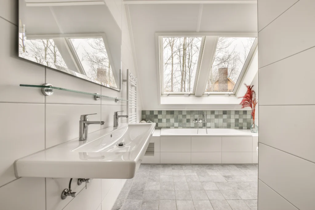 Hip to Gable Loft Conversion 1 modern bathroom with shower and sink 2023 11 27 05 05 52 utc - Neo Lofts Conversion London